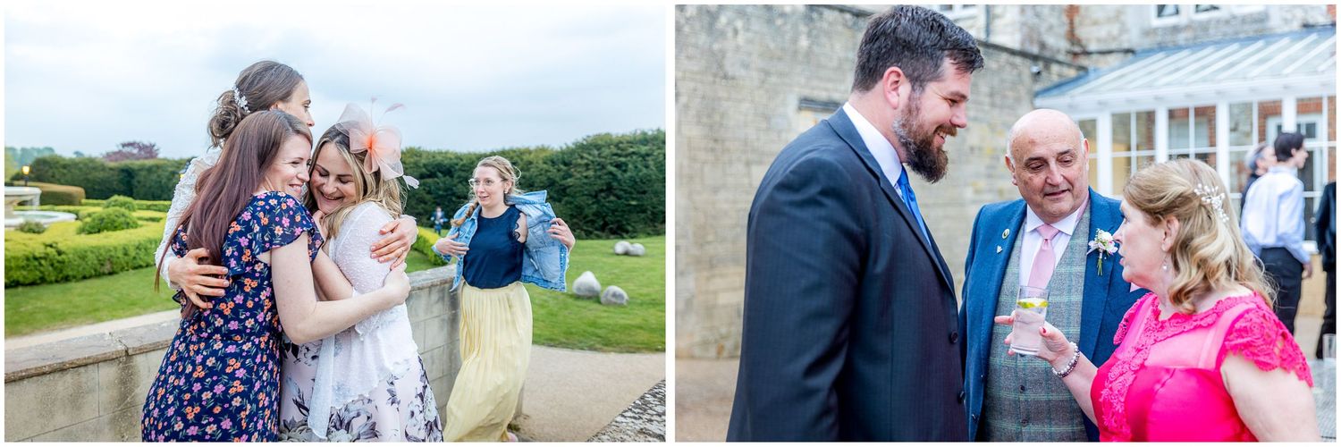 Wedding guests mingle and celebrate on sunny garden grounds.