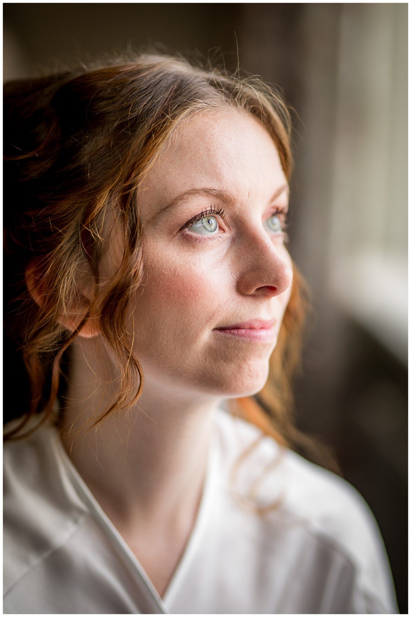 Close-up portraits in natural window light showing soft makeup and styling details.