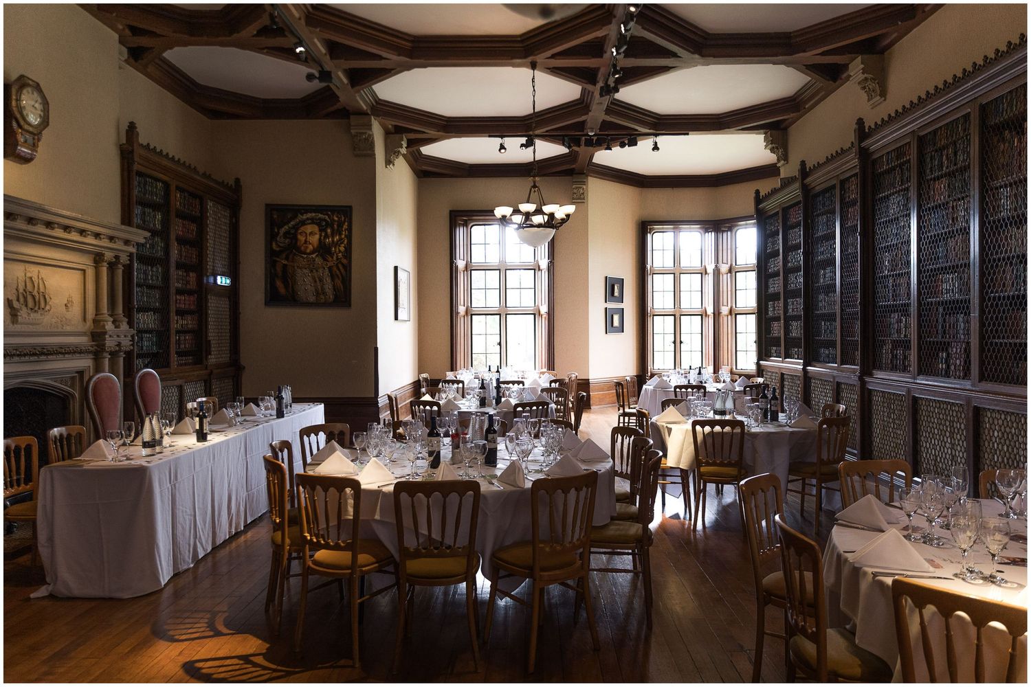 Elegant dining room in the library of The Elvetham, Hampshire wedding venue