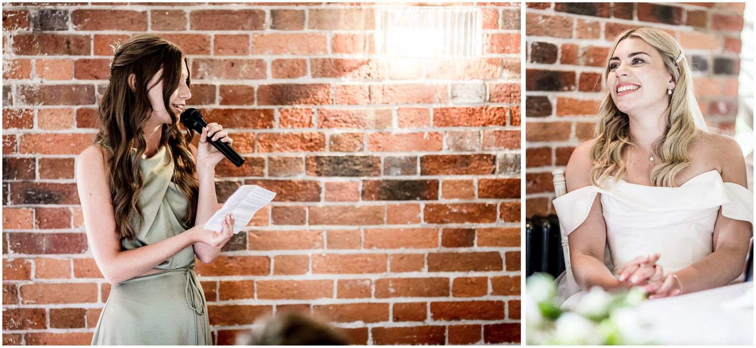 Wedding reception candids showing guests mingling near exposed brick walls with floral decor.