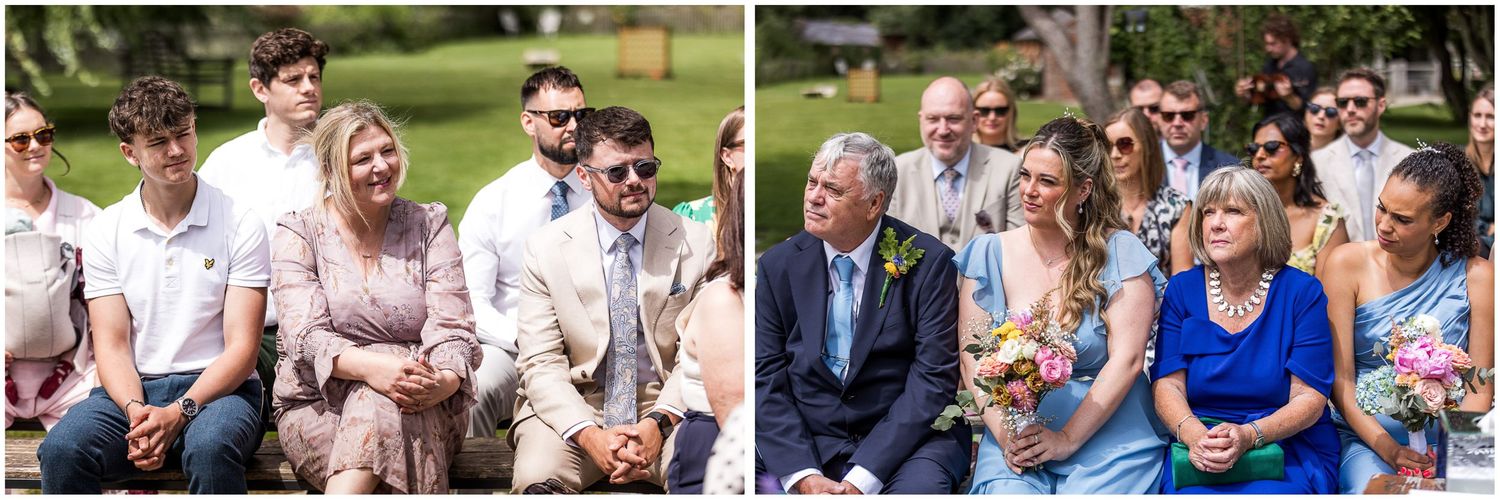 Wedding guests sat on wooden benches for an outdoor wedding ceremony in the New Forest