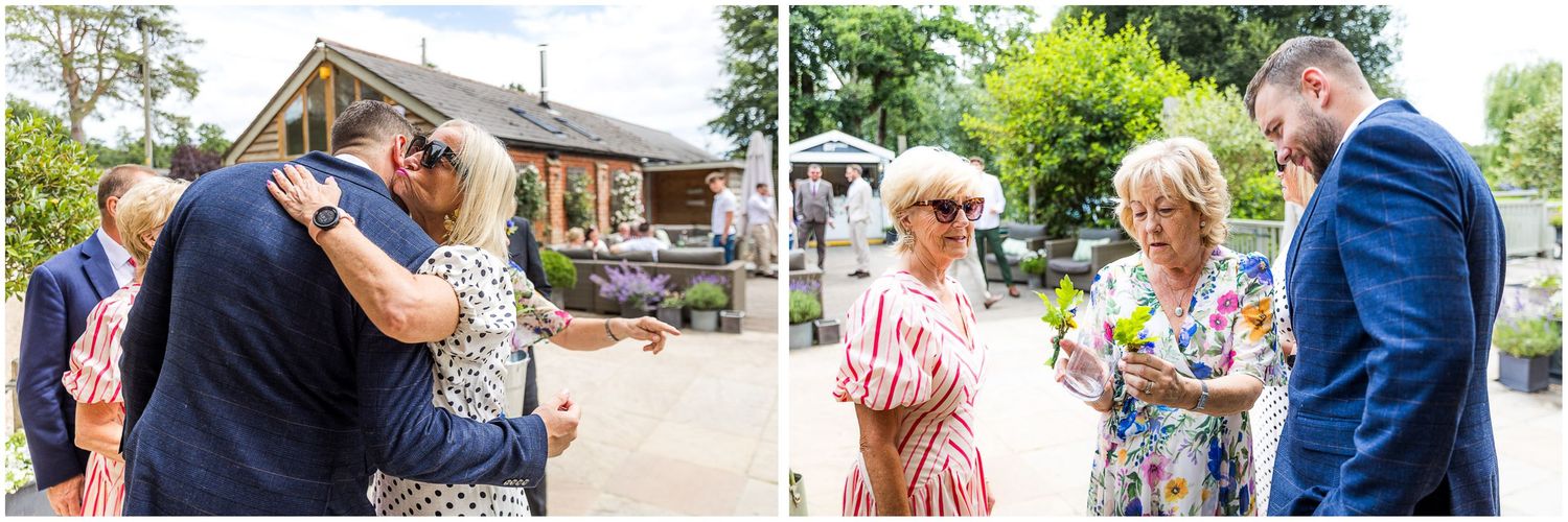 The groom greets guests as they arrive at Sopley Mill, a New Forest wedding venue.