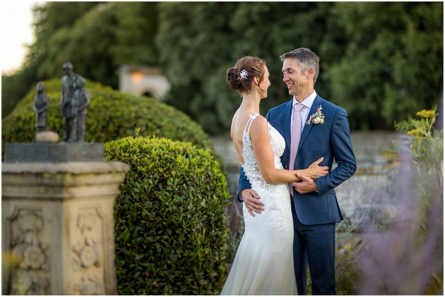 Bride and groom wedding photography in the gardens of Walhampton School near Lymington
