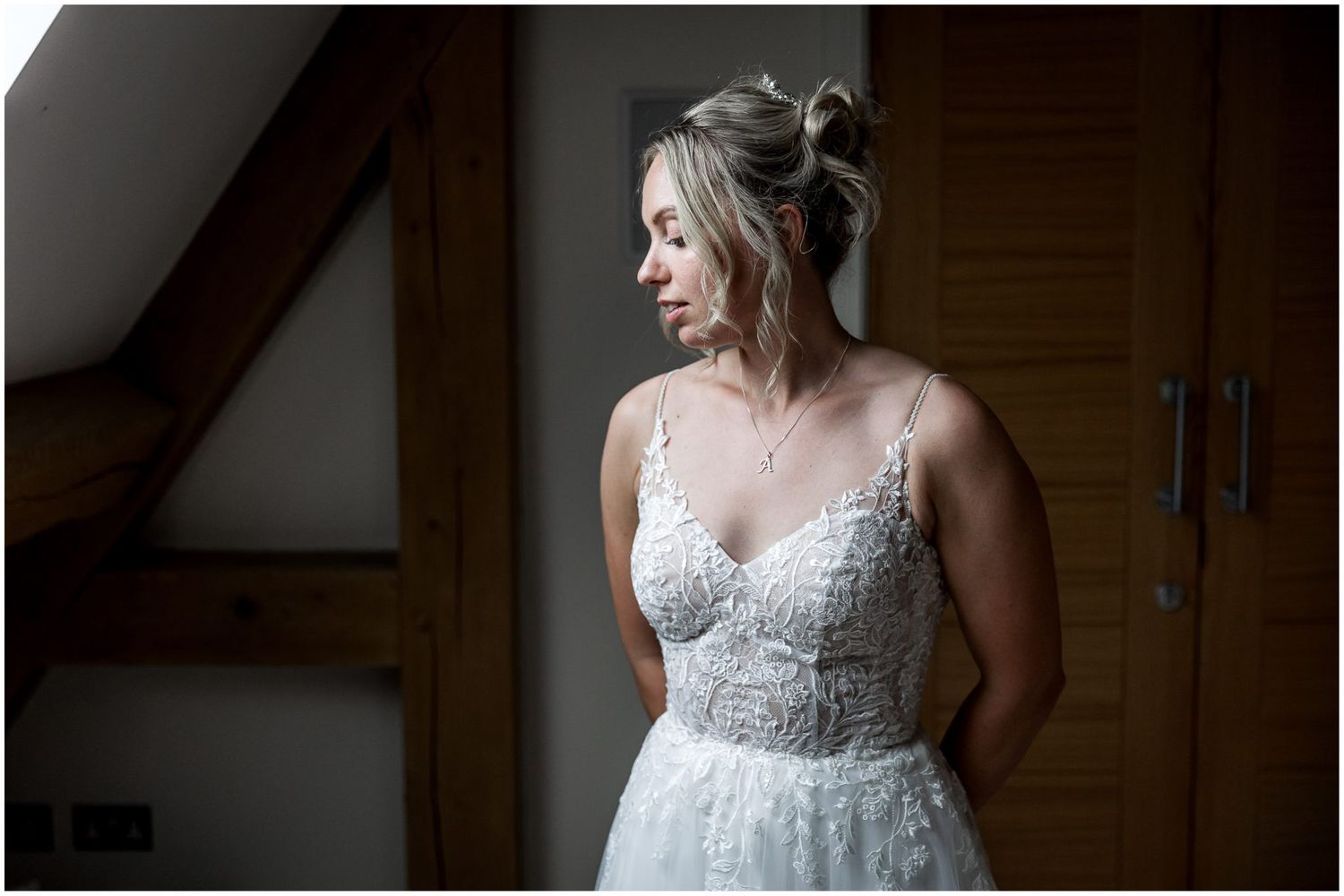 Elegant bridal preparations in soft natural window light.