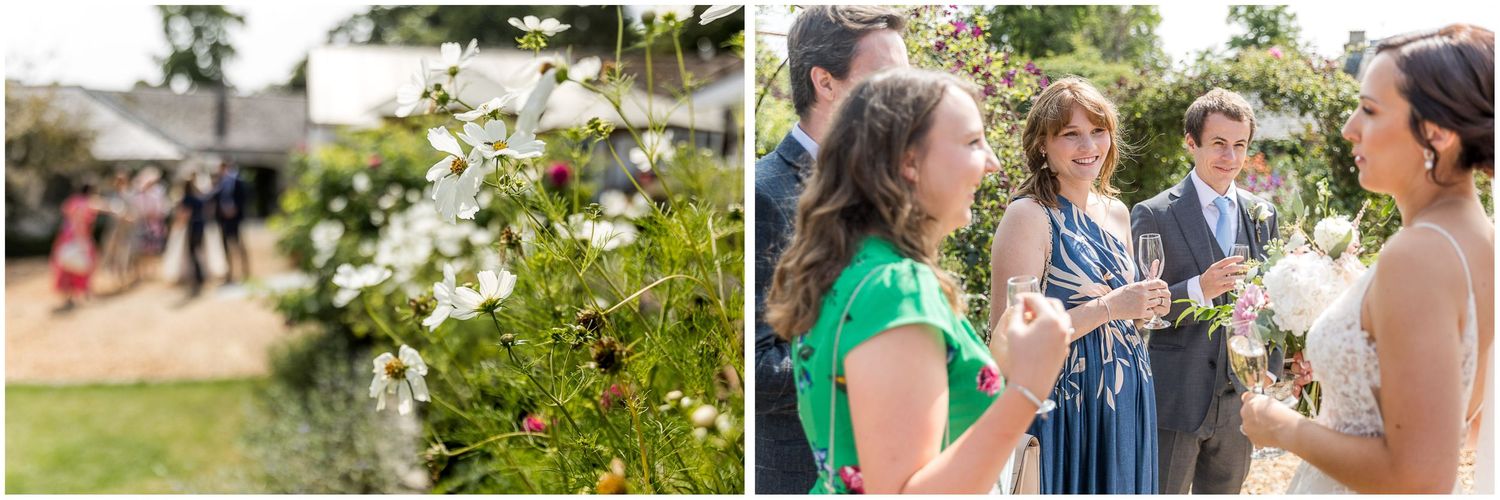 Outdoor garden wedding celebration with guests enjoying summer festivities.