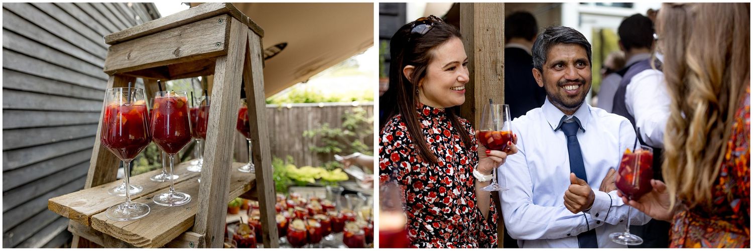Wedding reception details showing red lantern decorations and guests enjoying festivities.