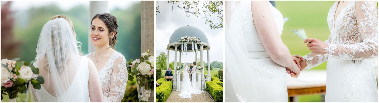 Wedding guests mingle and celebrate on a manicured lawn near an elegant white gazebo.