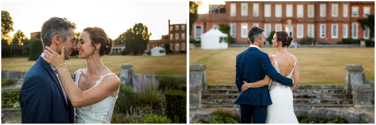 Bride and groom share a quiet moment during their evening wedding reception with Walhampton School New Forest wedding venue behind them.