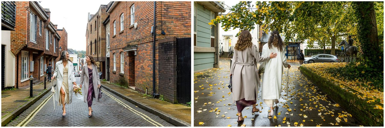 The bride walks with her daughter along Winchester's streets towards the Registry Office building