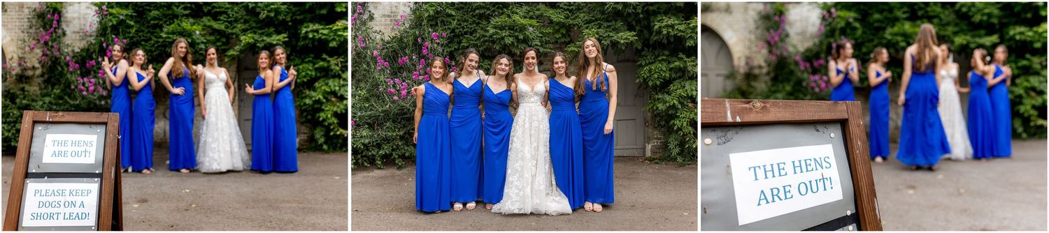 Wedding party poses for group photos in blue dresses and formal attire.