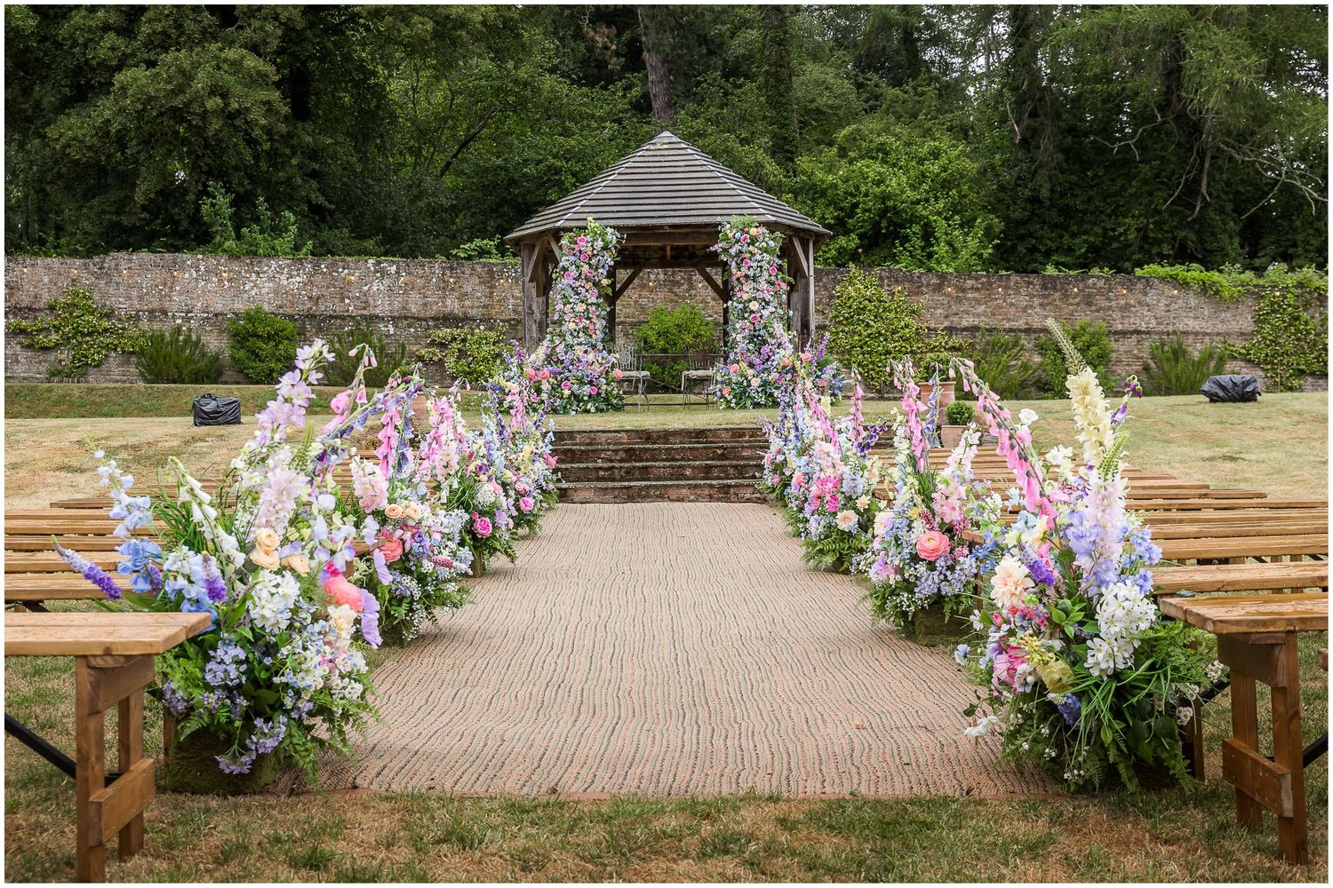 The walled garden at the Holywell Estate in Hampshire set up for an outdoor wedding ceremony