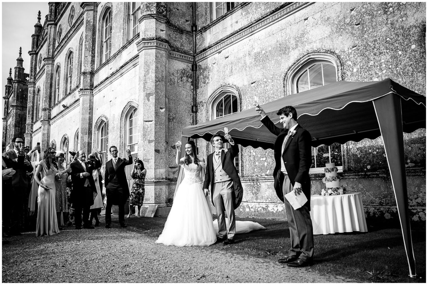 A black and white photo collage showing wedding scenes with couples and guests along a cobblestone street.