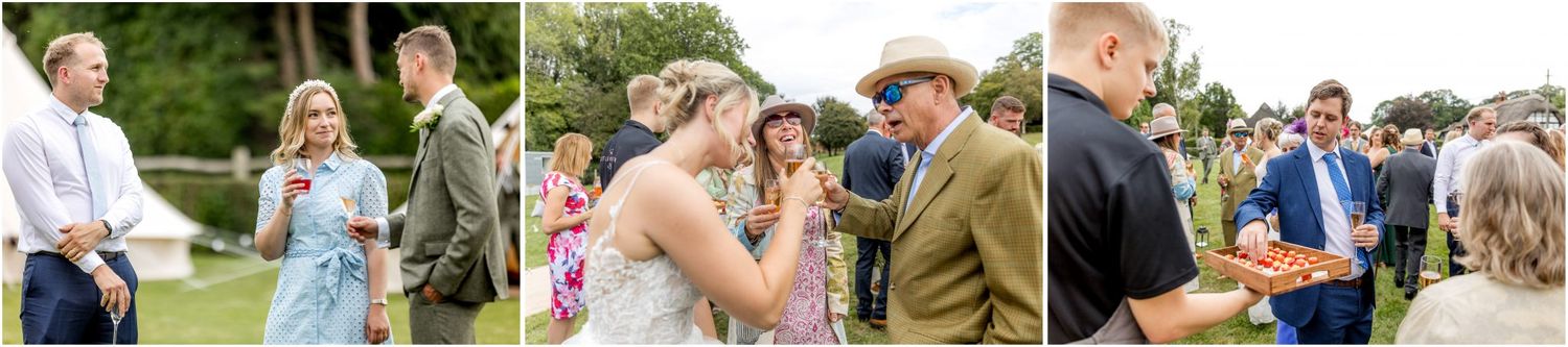 Wedding guests enjoying outdoor festivities on a sunny day with lawn games and refreshments.