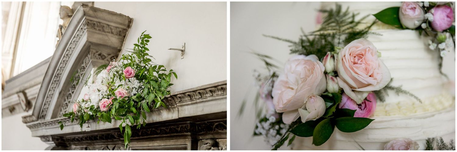Elegant floral arrangements with pink roses decorating a church entrance and reception table.