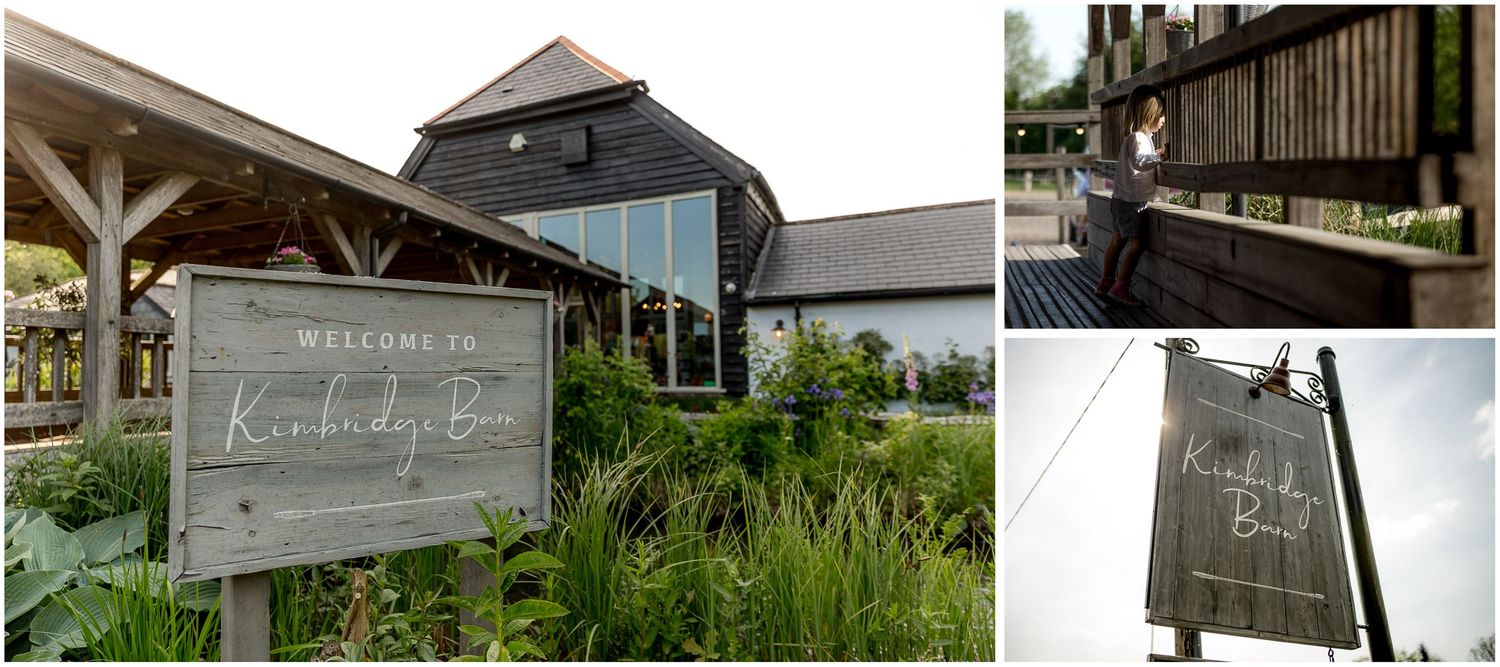 Rustic wedding venue exterior with wooden welcome sign and modern architecture.