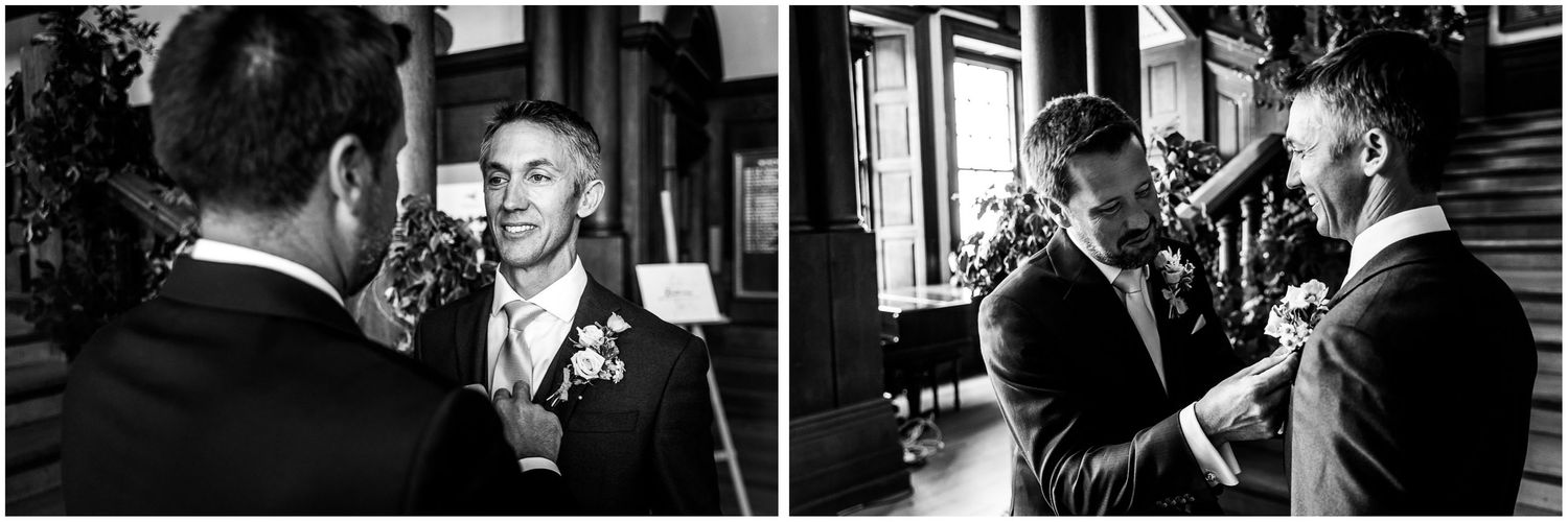 Black and white candid photography of groom and best man before the wedding ceremony begins