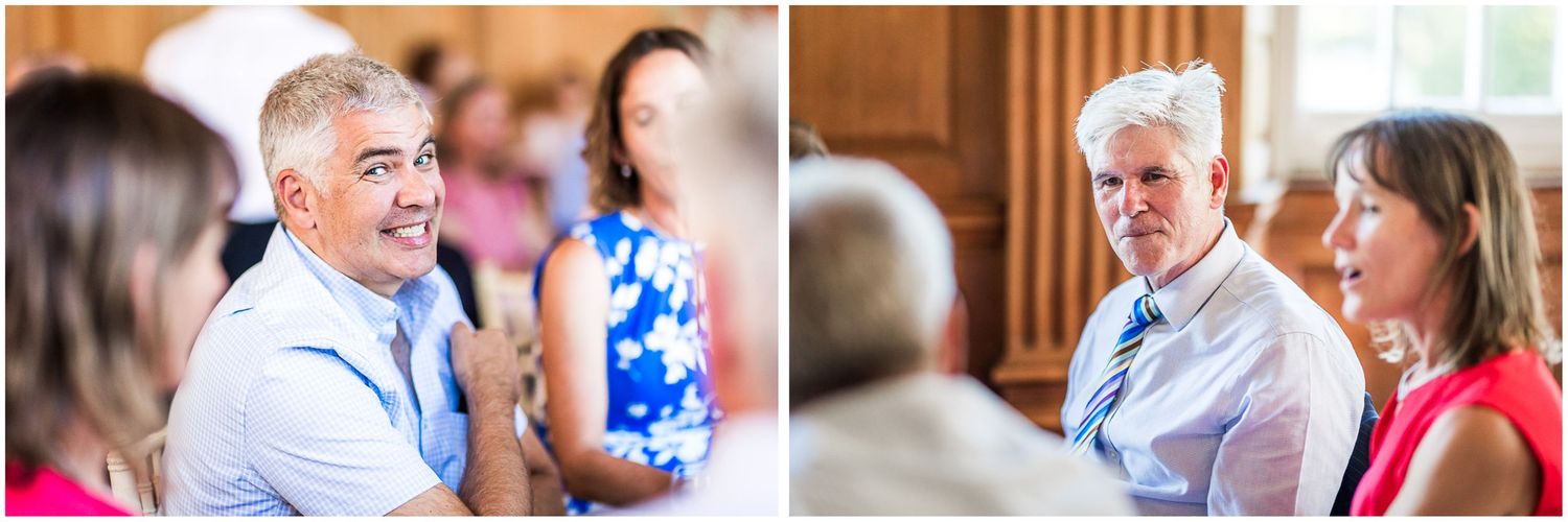 Two men and a woman engaged in conversation at a wedding reception at Walhampton School