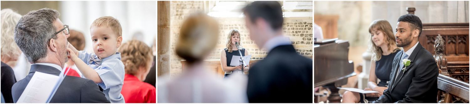 Guests celebrating and taking photos during a wedding ceremony in a historic church.
