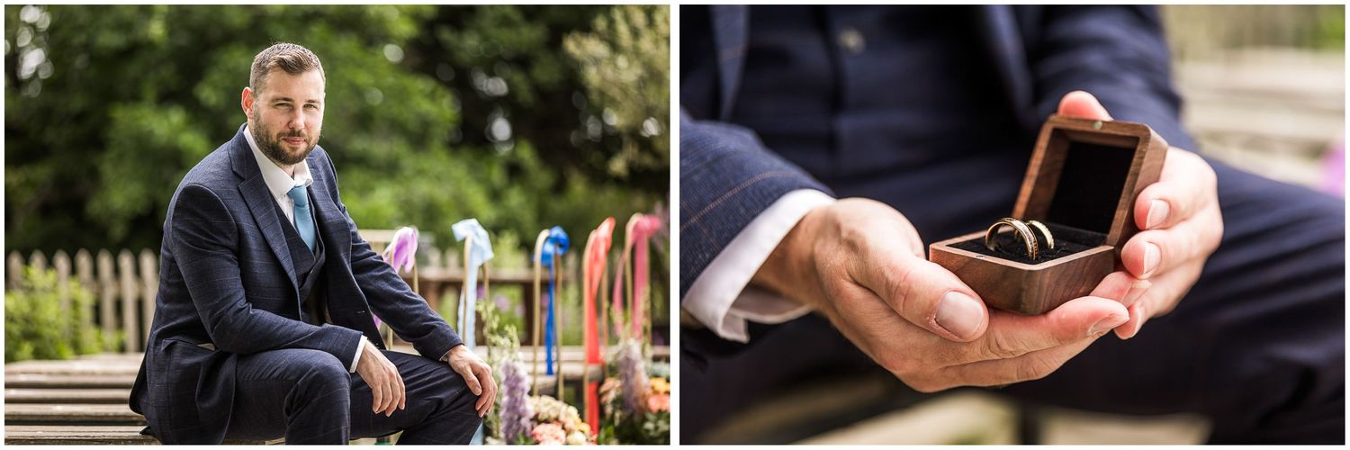 The groom seated outdoors for a wedding portrait before the ceremony, with his hands holding a wooden ring box with wedding rings.