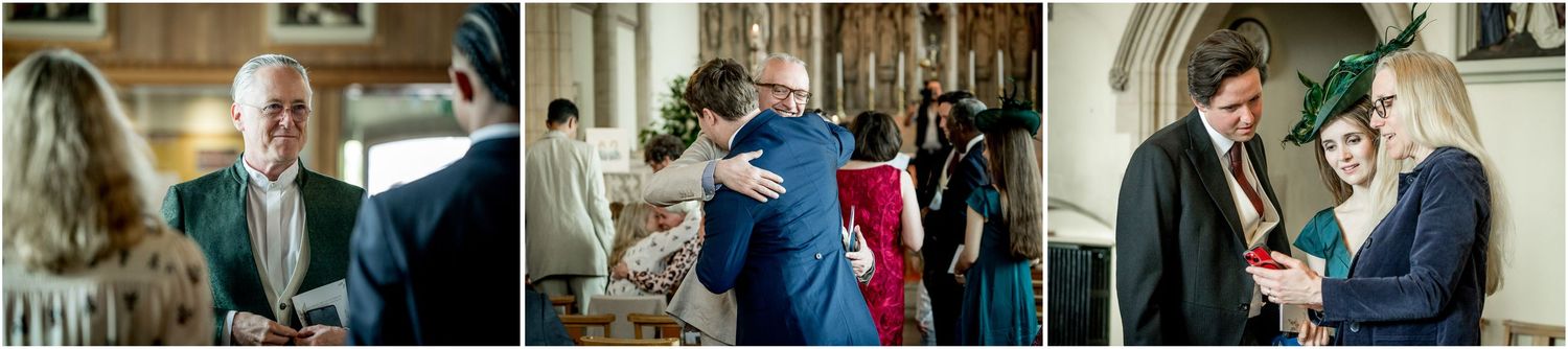 Wedding party members share joyful moments in a traditional church setting.