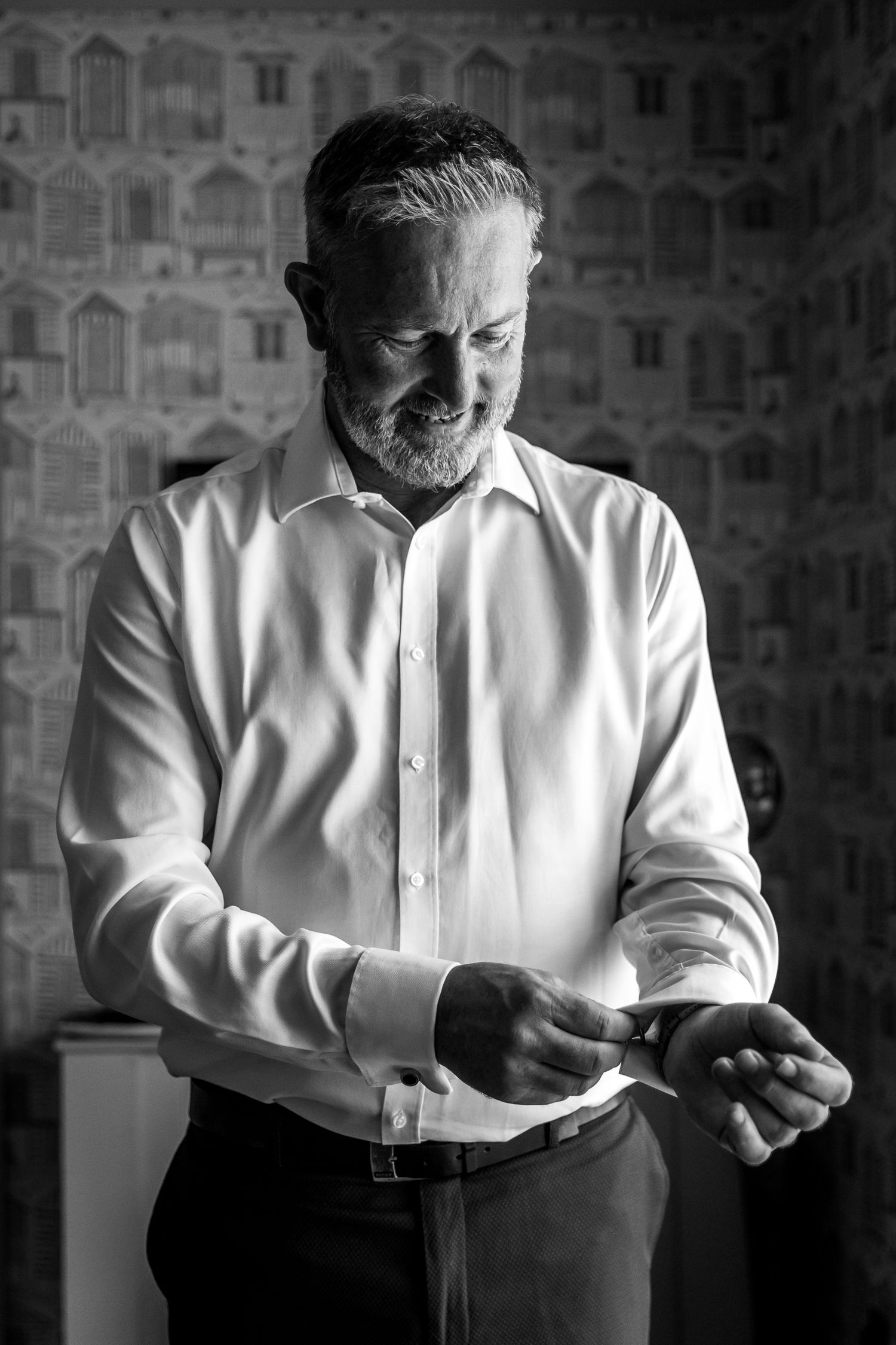 Dramatic black and white portraits showing contemplative expressions.