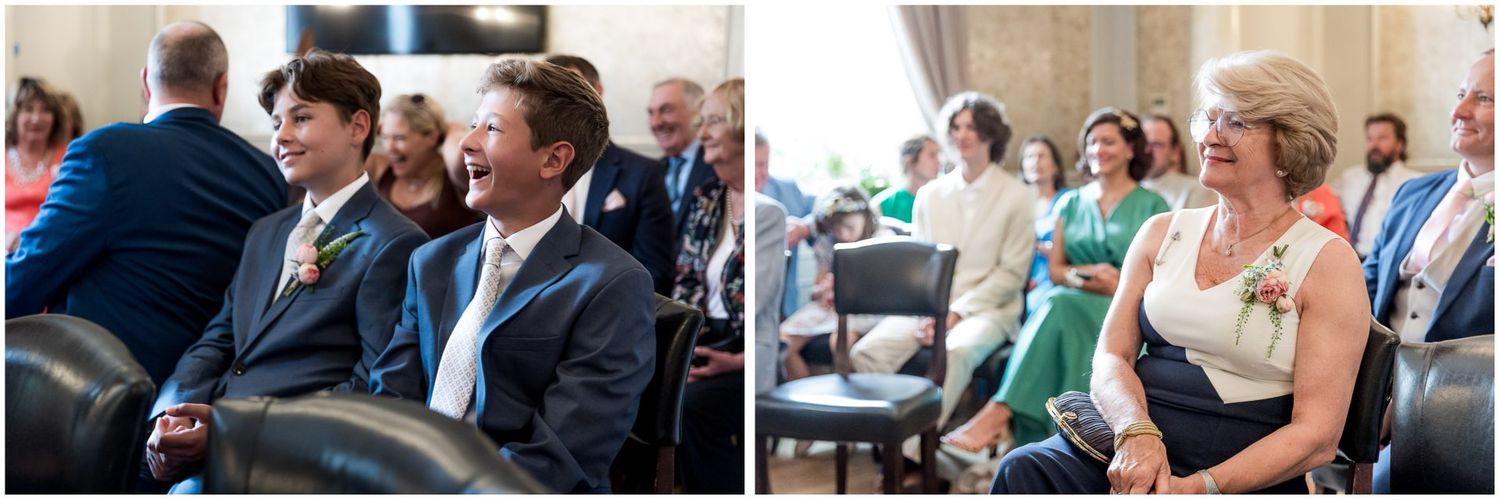 Wedding guests seated in rows during indoor ceremony with natural lighting.