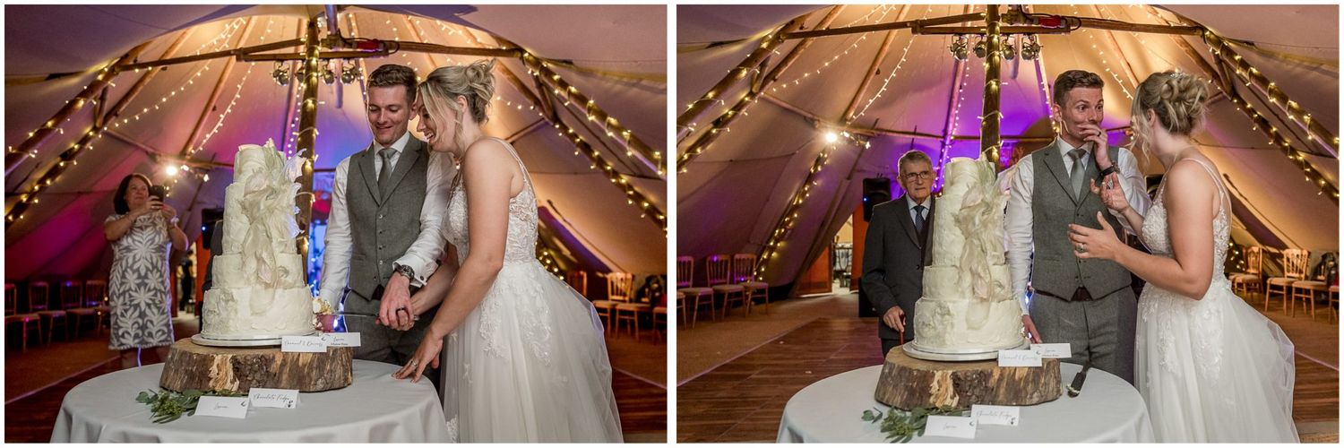 Wedding reception venue decorated with warm lighting and rustic wooden details.