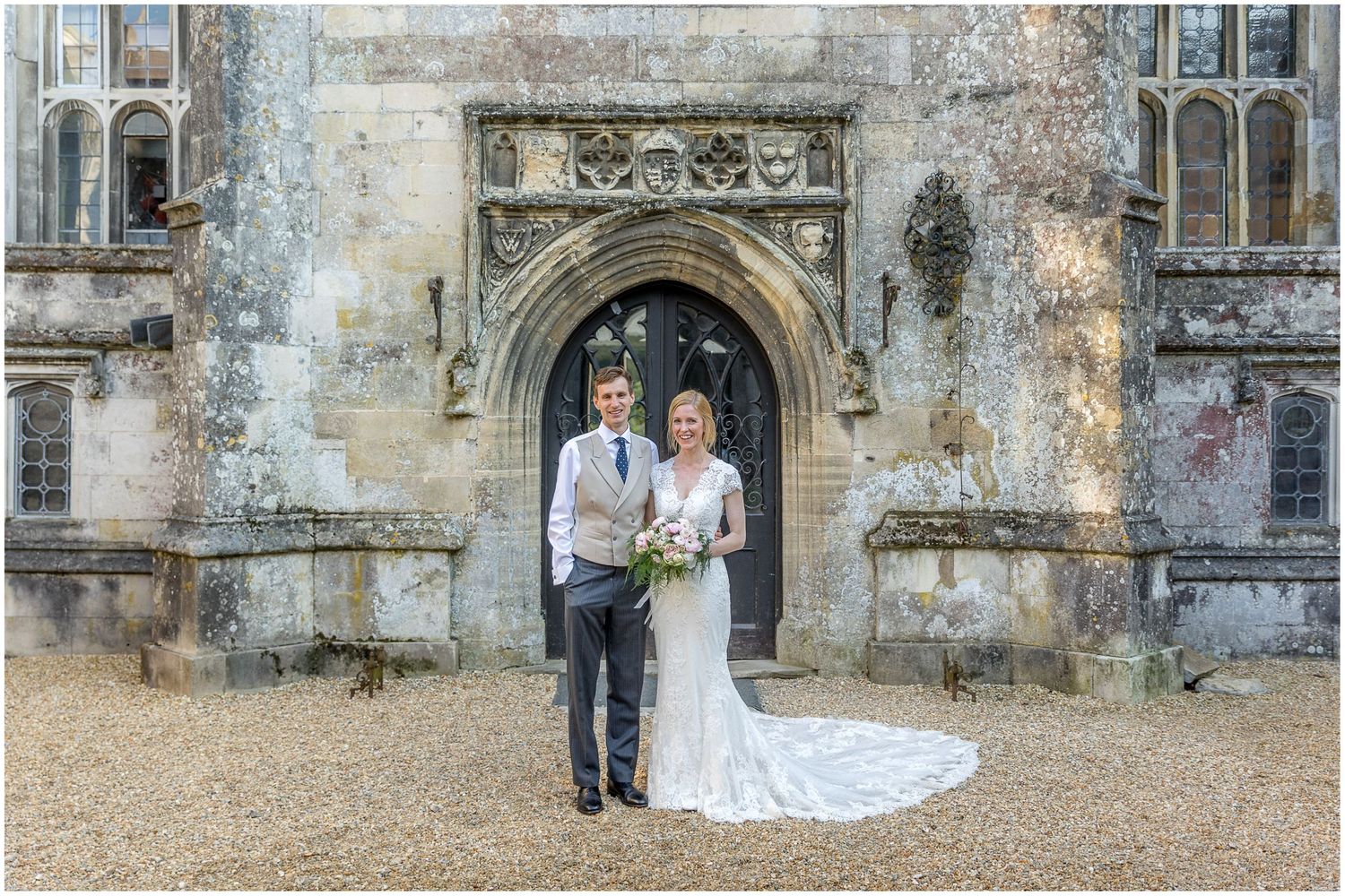 Romantic wedding portraits against weathered stone walls and gothic archways of historic building.