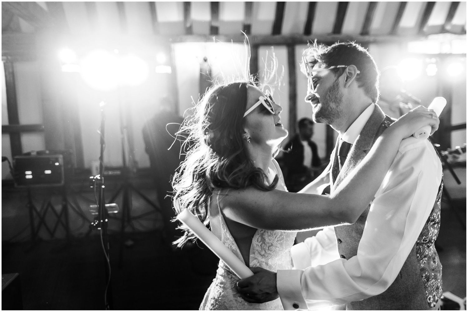 Black and white party photography with bride and groom on the dance floor