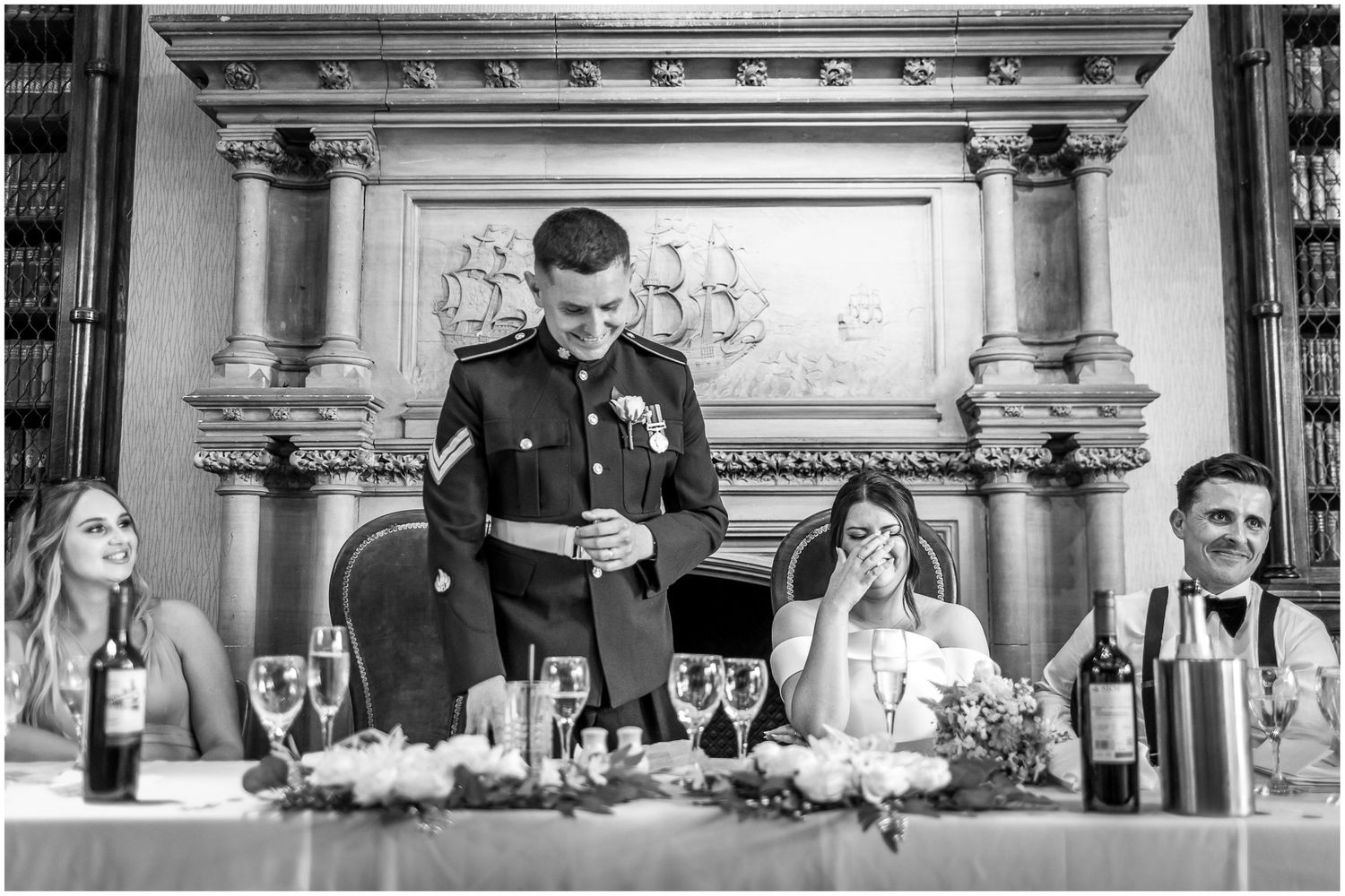 Black and white photo of the groom giving his wedding speech at The Elvetham Hotel