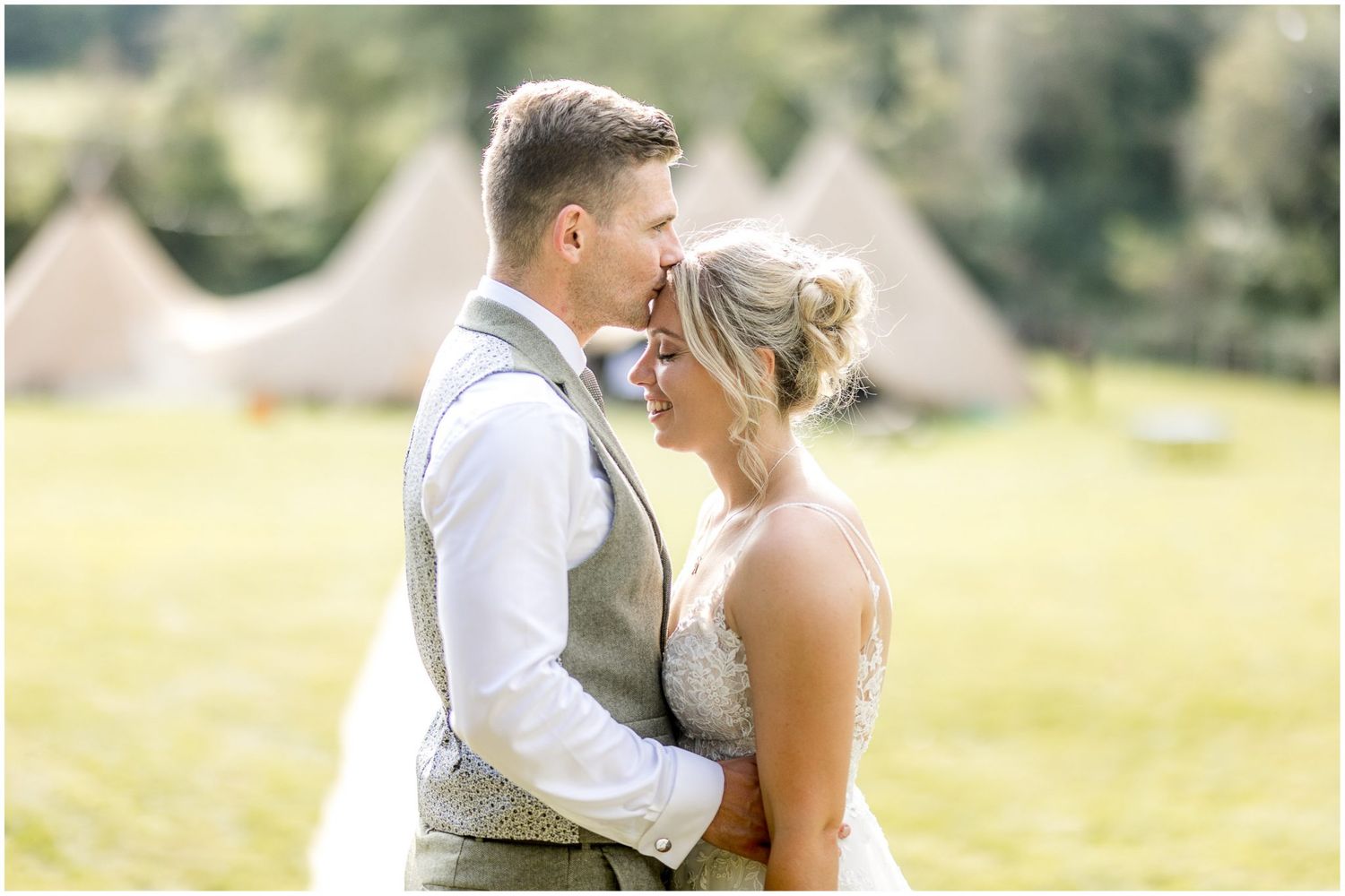A romantic outdoor wedding photoshoot in a sunny garden setting with soft natural lighting.