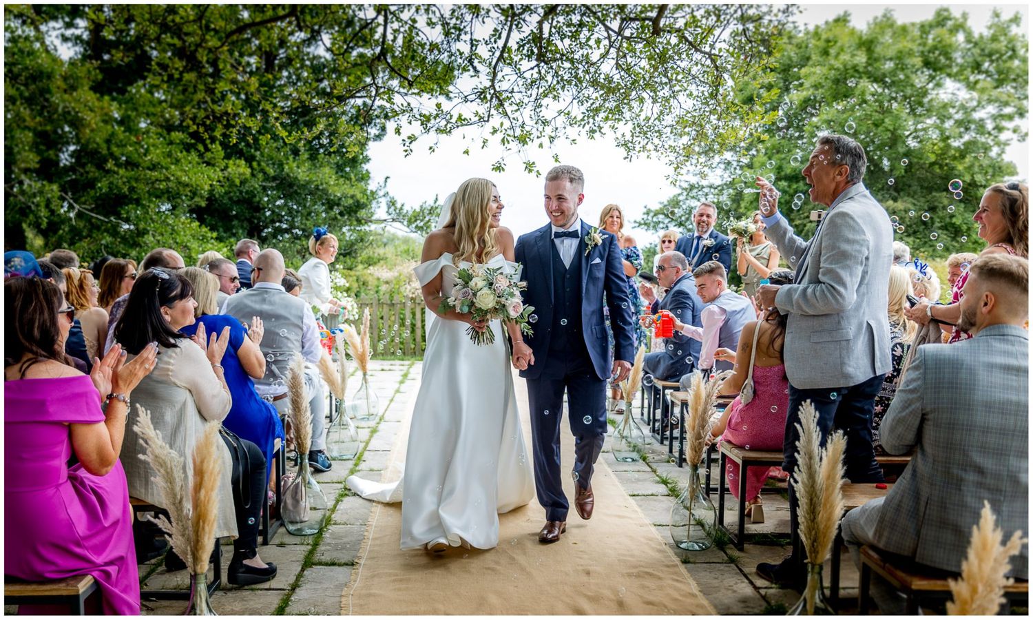 Wedding celebration sequence showing guests and couple during outdoor ceremony procession.