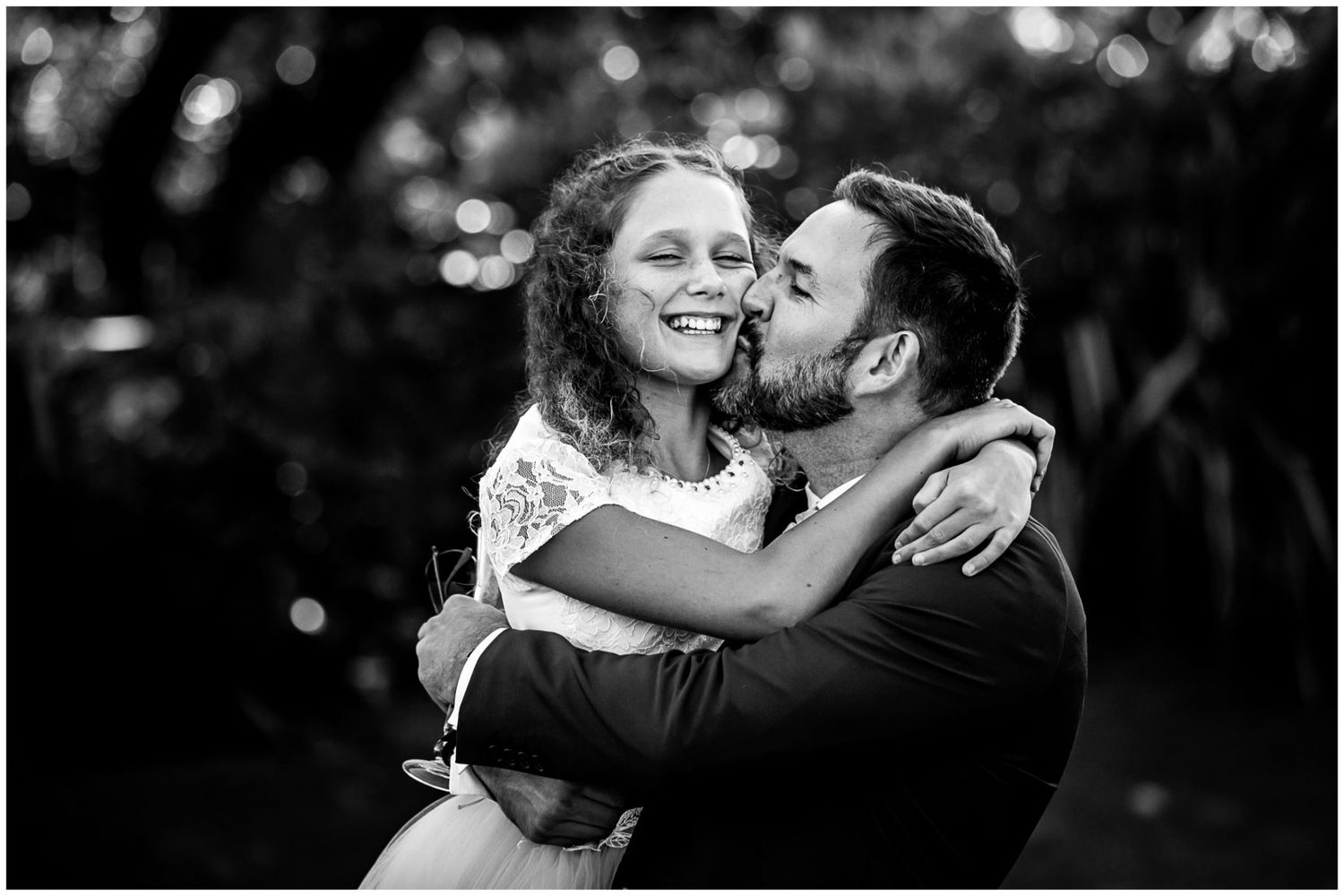 A series of black and white photos showing couples embracing and dancing during a romantic wedding celebration.