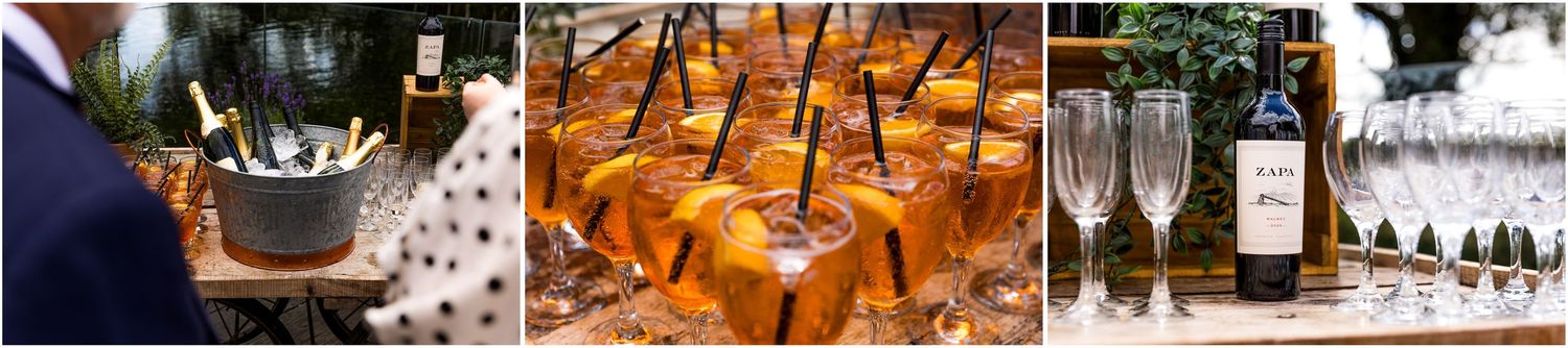 Elegant wedding reception drinks by Thirsty Willow bars at Sopley Mill with champagne bucket, Pimms and wine.