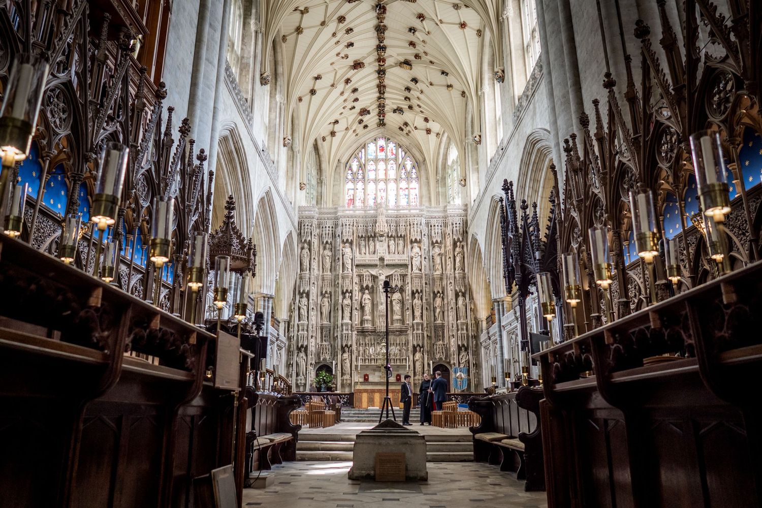 Interior of Gothic cathedral with vaulted ceiling and ornate architectural details.