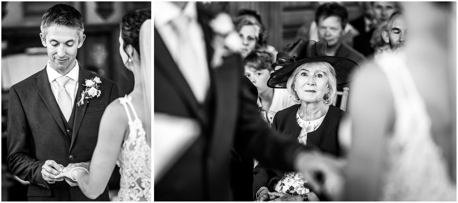 A wedding guest watches as the bride and groom exchange rings