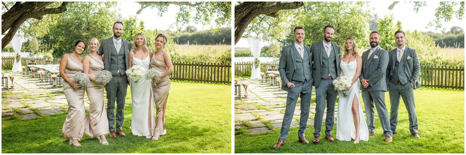 Wedding party poses on lush green lawn during summer celebration.