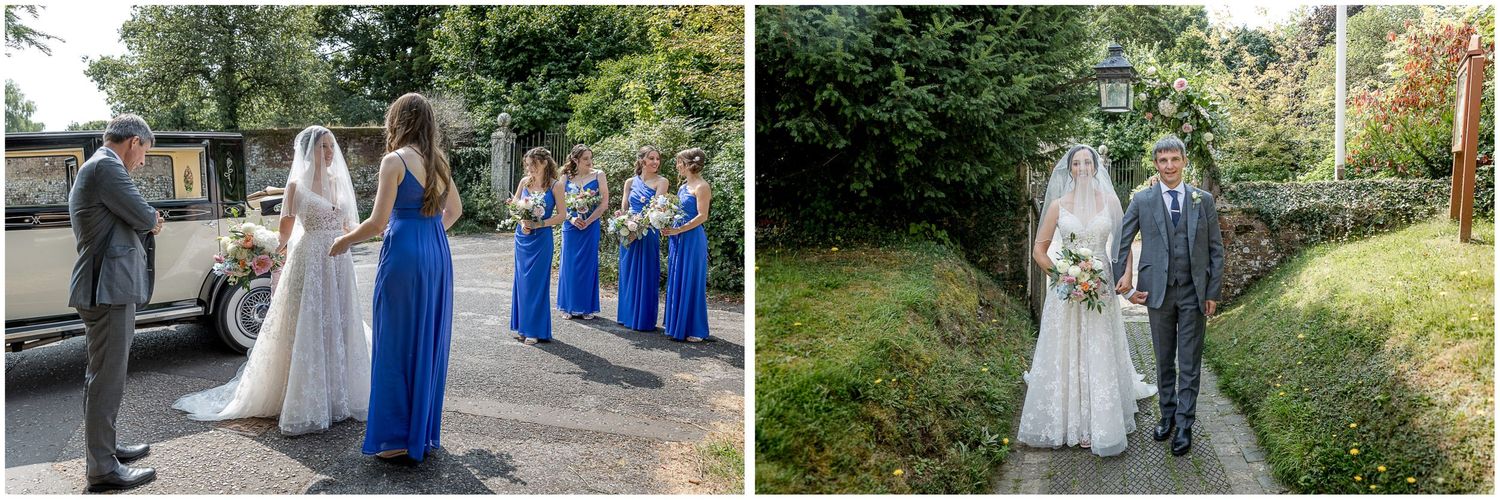 Wedding party walking along a tree-lined path in summer garden setting.