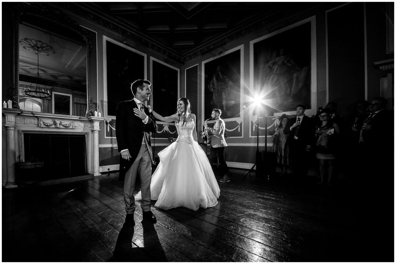 A romantic black and white wedding photo series showing couples dancing and embracing in elegant indoor venues.