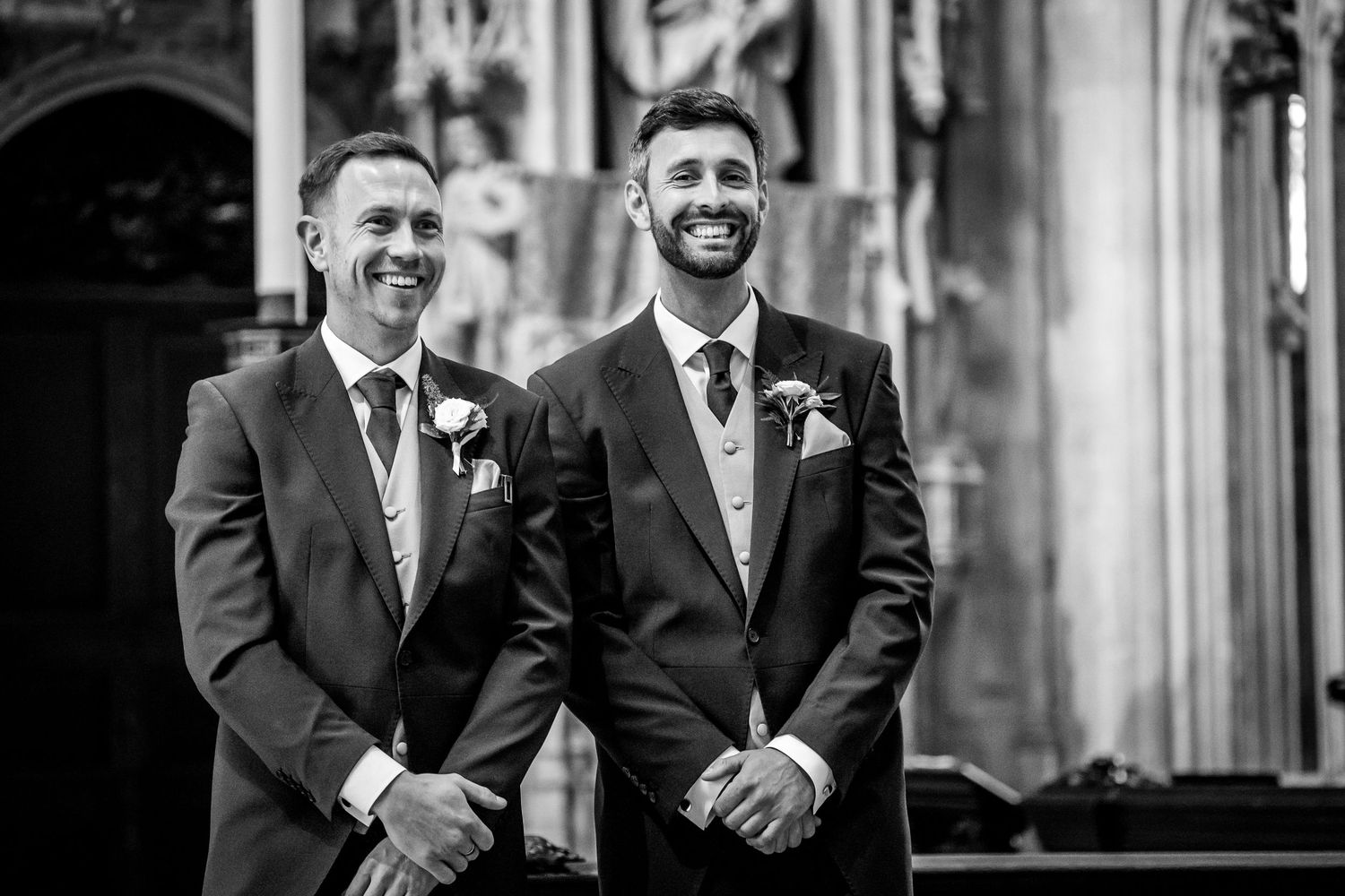 Black and white portraits show wedding guests and party members sharing laughs at the ceremony.