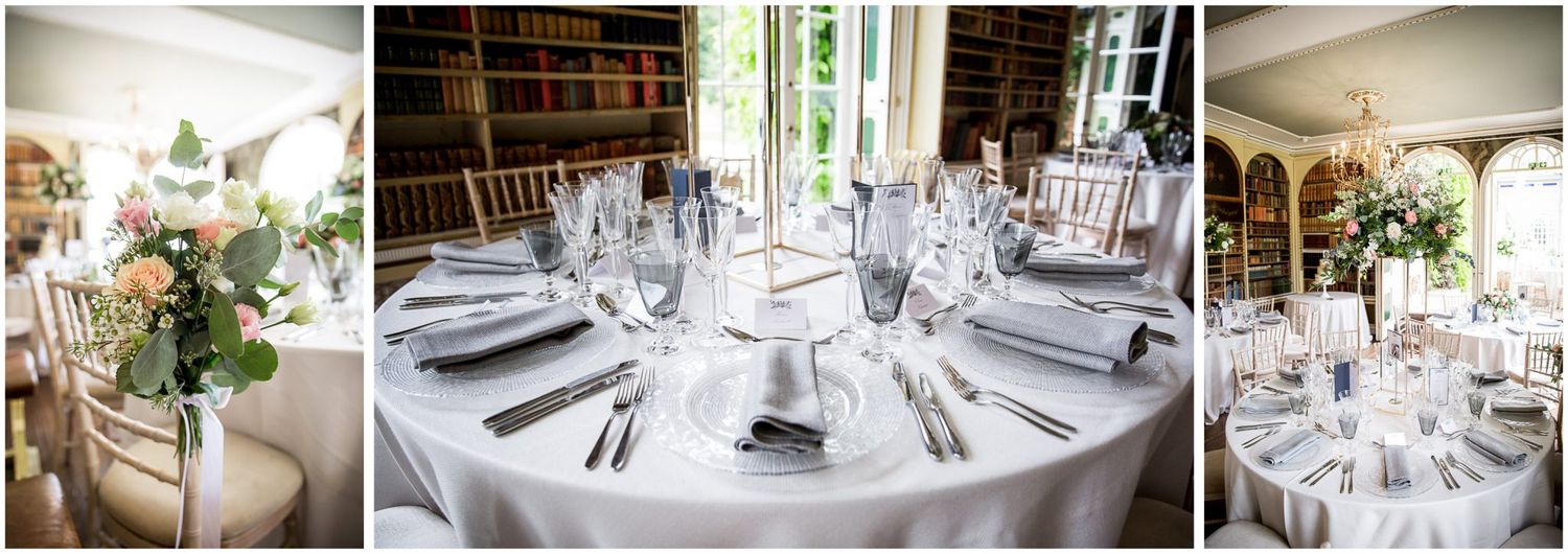 Elegant wedding reception tables set with fine china and glassware in bright conservatory setting.