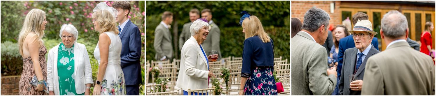 Wedding party poses and celebrates outdoors during a summer celebration.