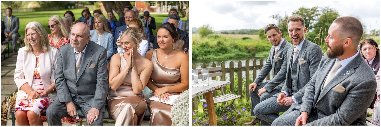 Guests mingle during an outdoor wedding reception with lush greenery in the background.