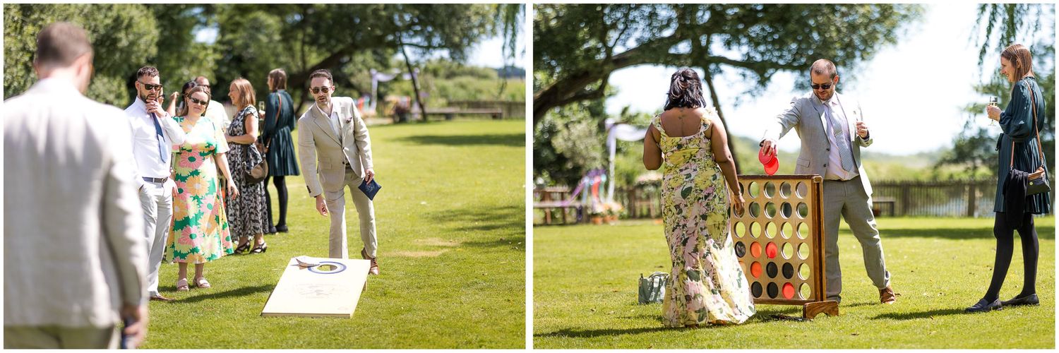 Guests enjoy garden games including at an outdoor wedding reception in the New Forest.