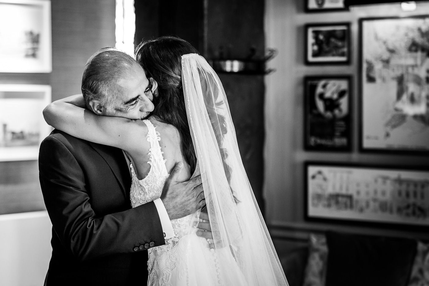 Black and white wedding photography showing intimate moments during the celebration.