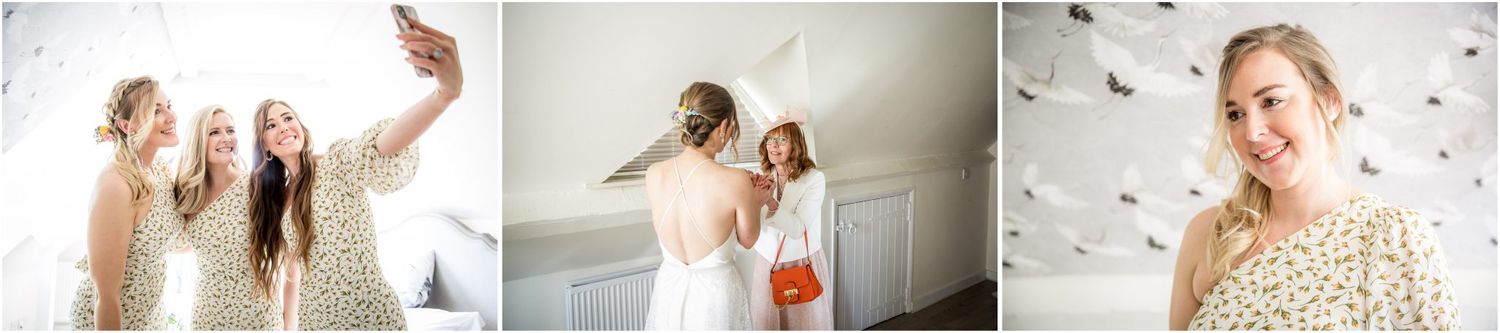 Bridesmaids sharing joyful moments while preparing for wedding ceremony.