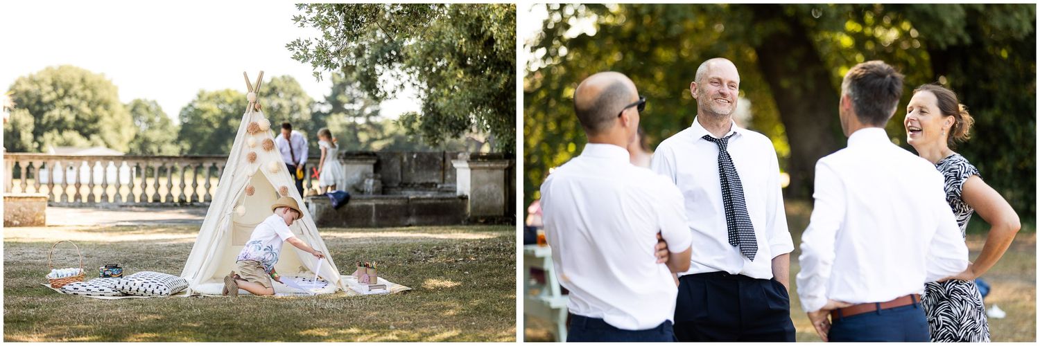 Bride and wedding guests in the shaded grounds of Walhampton School for a wedding drinks reception in the New Forest