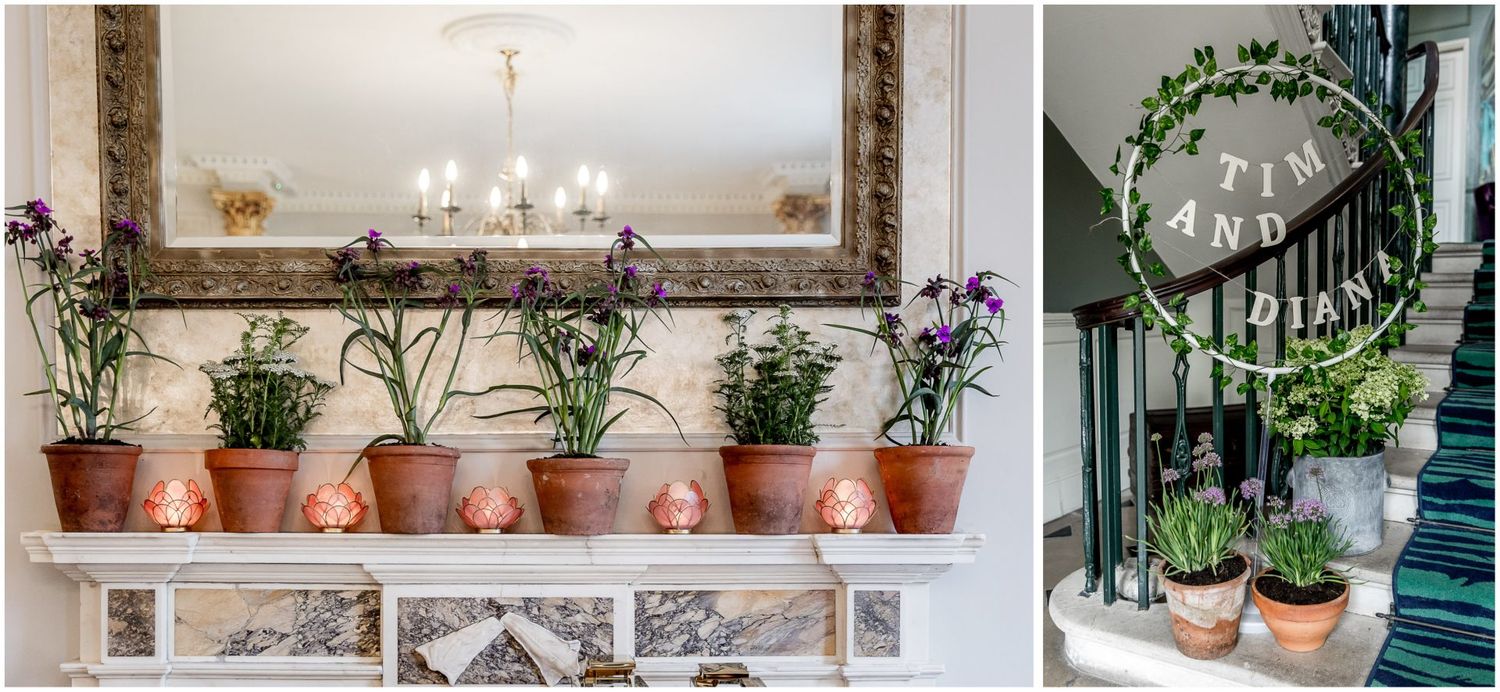 Elegant wedding venue interior with floral arrangements and decorative details along a wall.
