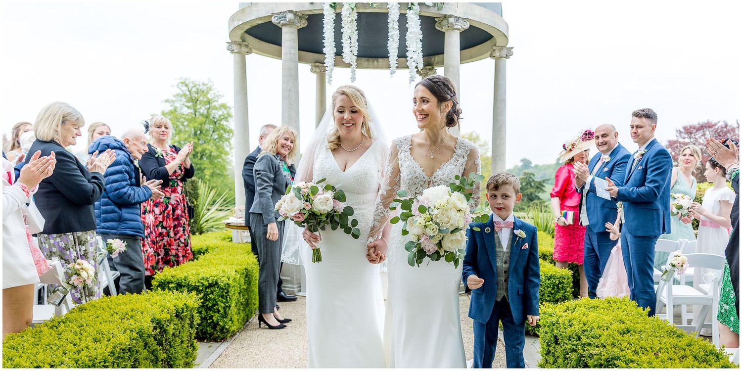 Wedding celebration scenes around a white gazebo with guests mingling on manicured grounds.
