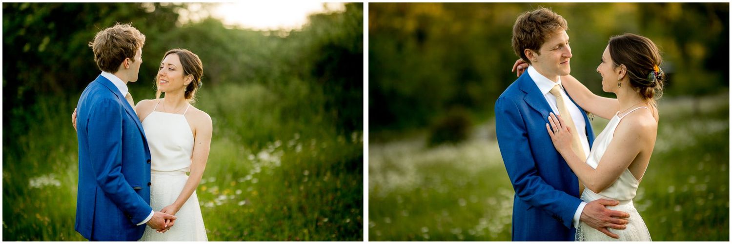Couple shares romantic moments in golden sunlit meadow during sunset wedding photoshoot.